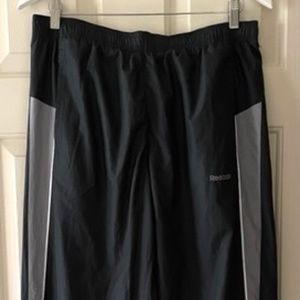 Men's Reebok Dark Gray Woven Activewear Pant with Mesh Lining